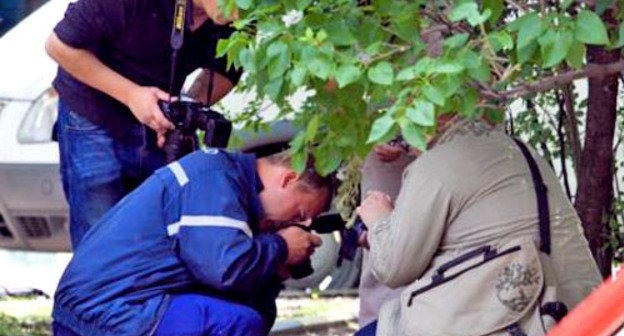Следственная группа на месте убийства Юрия Буданова. Москва, 10 июня 2011 г. Фото: Yuri Timofeyev (RFE/RL)