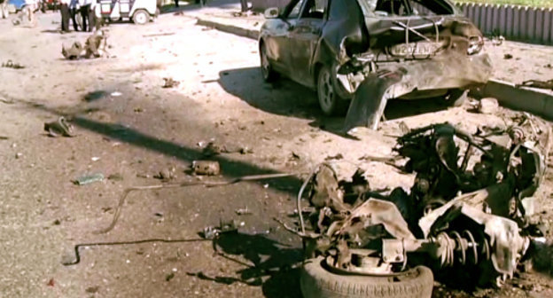На месте двойного теракта в Махачкале 20 мая 2013 г. Кадр из видеосъемки пресс-службы МВД Дагестана, 05.mvd.ru