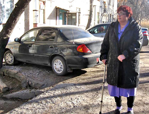 Татьяну Орлову, которая находится в трудной жизненной ситуации, выселяют из помещения маневренного жилищного фонда. Волгоград, 27 ноября 2013 г. Фото Вячеслава Ященко для "Кавказского узла"