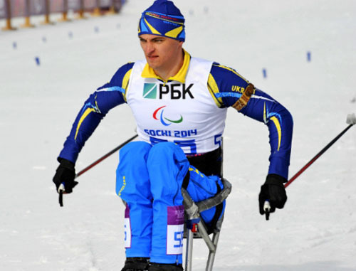 Украинский спортсмен Максим Яровой во время соревнований в лыжных гонках среди мужчин в категории "сидя". Сочи, 12 марта 2014 г. Фото: министерство молодежи и спорта Украины http://dsmsu.gov.ua/ Украинский спортсмен Максим Яровой во время соревнований в лыжных гонках среди мужчин в категории "сидя". Сочи, 12 марта 2014 г. Фото: министерство молодежи и спорта Украины http://dsmsu.gov.ua/