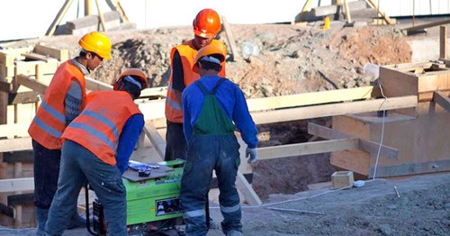 Строители. Фото: Юрий Гречко / Югополис