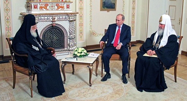 Патриарх Грузии Илия II на встрече с президентом России и главой Русской православной церкви. Фото: Kremlin.ru