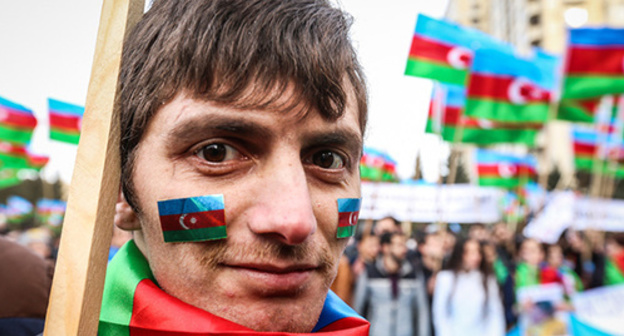 Участник акции протеста в Баку. Фото Азиза  Каримова для "Кавказского узла".
