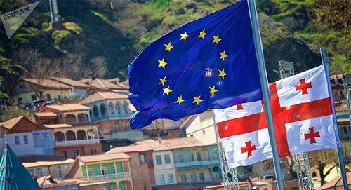 Флаги Евросоюза и Грузии в центре Тбилиси. © Sputnik / Alexander Imedashvili https://sputnik-georgia.ru/politics/20171121/238253657/Ambicioznaja-povestka-dnja-dlja-Gruzii-novyj-jetap-associacii-s-ES.html Флаги Евросоюза и Грузии в центре Тбилиси. © Sputnik / Alexander Imedashvili https://sputnik-georgia.ru/politics/20171121/238253657/Ambicioznaja-povestka-dnja-dlja-Gruzii-novyj-jetap-associacii-s-ES.html