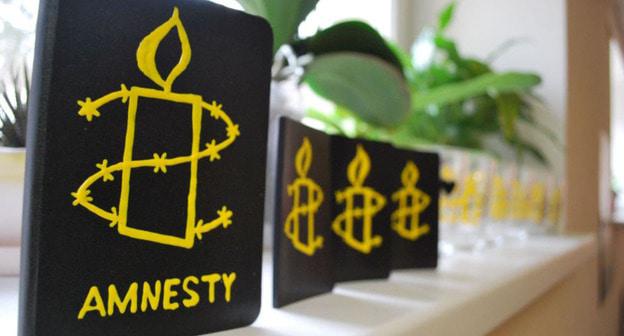 Логотип Amnesty International. Фото: Diana Ralleanu (RFE/RL)