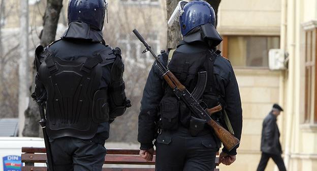 Сотрудники силовых структур. Фото: REUTERS/David Mdzinarishvili