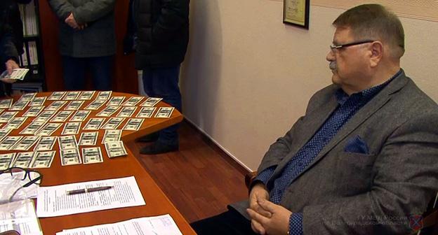 Александр Богомолов во время ареста. Фото https://34.мвд.рф