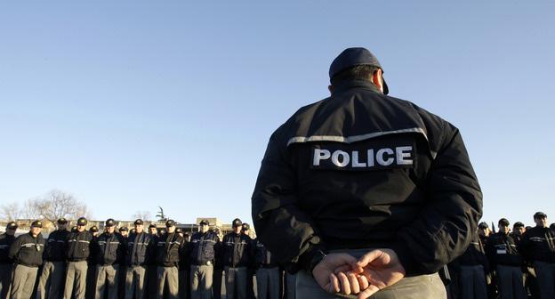 Сотрудник полиции. Грузия. Фото: REUTERS/David Mdzinarishvili 