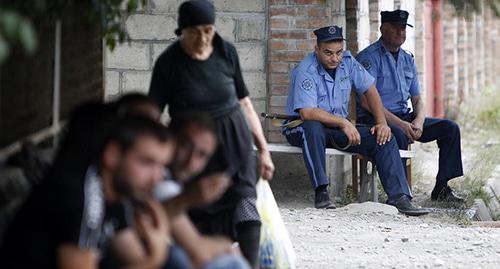 Сотрудники полиции. Грузия. Фото: REUTERS/David Mdzinarishvili