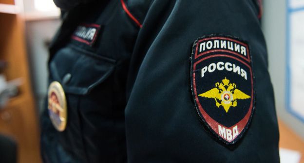 Сотрудник полиции. Фото Елены Синеок, Юга.ру