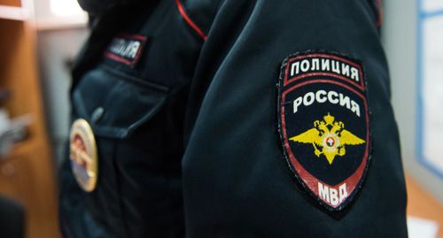 Сотрудник полиции. Фото Елены Синеок, Юга.ру