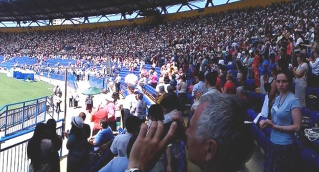 Свидетели Иеговы* в одной из стран, где их деятельность разрешена законом. Фото Юлии Кашеты для "Кавказского узла".