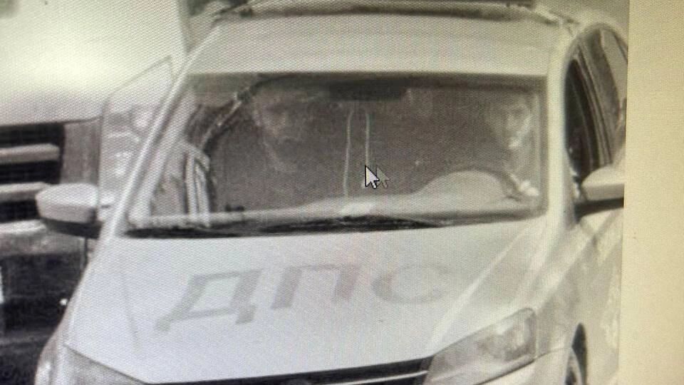 Участники перестрелки в машине ДПС. 5 мая 2025 года. Скриншот видео Телеграм-канала RT на русском.