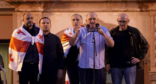 Слева направо: Иракли Надирадзе, Паата Манжгаладзе, Паата Бурчуладзе, Муртаз Зоделава,  Лаша Беридзе на акции 04.10.25. Скриншот фото "Интерпрессньюс" https://www.interpressnews.ge/ru/article/174819-po-delu-4-oktiabria-paata-burchuladze-murtaz-zodelava-iraklii-nadiradze-lasha-beridze-i-paata-mandzhgaladze-prigovoreny-k-7-tornike-mchedlishvili-nika-gventsadze-iraklii-chkhvirkiia-k-5-a-iraklii-shaishmelashvili-k-2-godam-lisheniia-svobody.